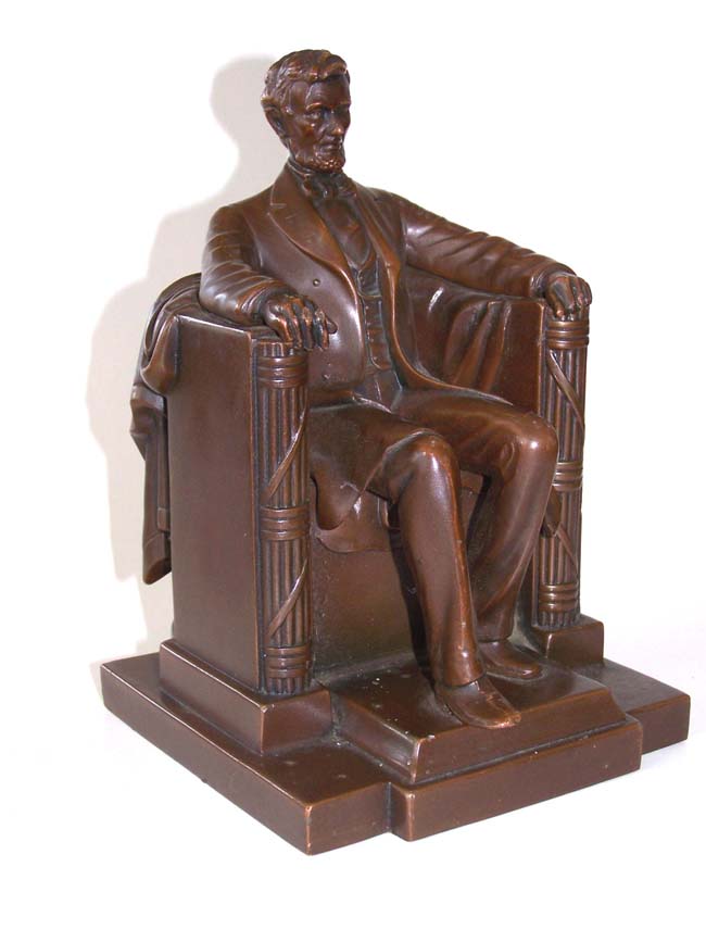 A Wonderful Single Antique Bookend of Lincoln sitting in the chair at the Lincoln Memorial circa 1925.